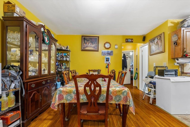 2722 Barnes Ave, Bronx, NY 10467 - dining area with wood finished floors