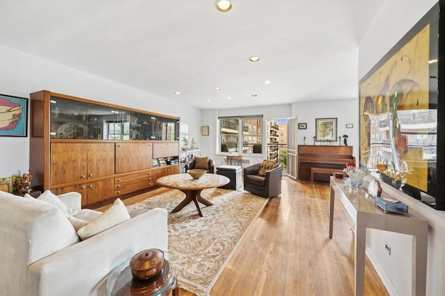 162-41 Powells Cove Blvd Unit 4G, Beechhurst, NY 11357 - living room featuring light wood finished floors and recessed lighting