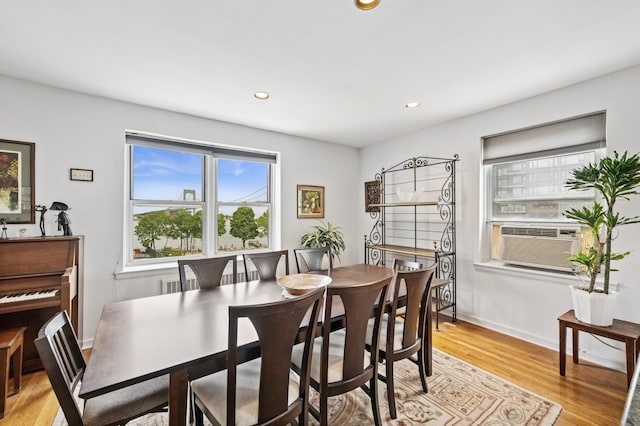 162-41 Powells Cove Blvd Unit 4G, Beechhurst, NY 11357 - dining space with light wood finished floors, recessed lighting, cooling unit, and baseboards