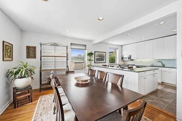 162-41 Powells Cove Blvd Unit 4G, Beechhurst, NY 11357 - dining area featuring recessed lighting, light wood finished floors, baseboards, and cooling unit