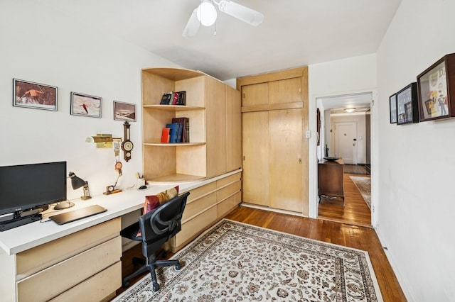 162-41 Powells Cove Blvd Unit 4G, Beechhurst, NY 11357 - office space featuring built in desk, wood finished floors, and a ceiling fan