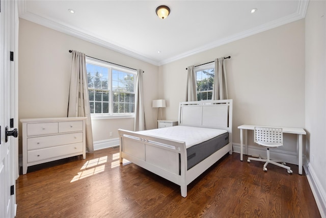 bedroom with multiple windows, dark wood-type flooring, ornamental molding, baseboards, and recessed lighting
