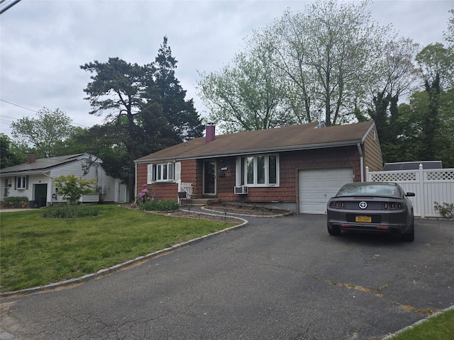 2905 Heather Ave, Medford, NY 11763 - ranch-style home with an attached garage, a chimney, driveway, and a shingled roof