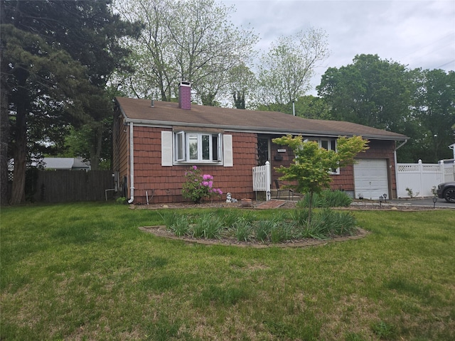 2905 Heather Ave, Medford, NY 11763 - view of front of house featuring an attached garage and a chimney