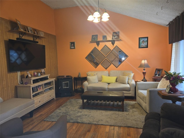 2905 Heather Ave, Medford, NY 11763 - living room featuring vaulted ceiling, a chandelier, a textured ceiling, and wood finished floors