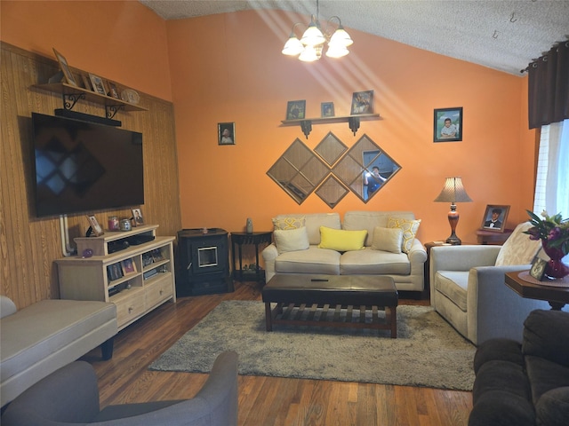 2905 Heather Ave, Medford, NY 11763 - living area featuring vaulted ceiling, a chandelier, a textured ceiling, and wood finished floors