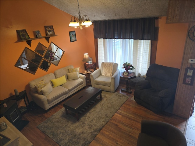 2905 Heather Ave, Medford, NY 11763 - living room with a textured ceiling, wood finished floors, lofted ceiling, and a chandelier
