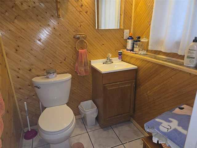 2905 Heather Ave, Medford, NY 11763 - bathroom with tile patterned flooring, toilet, wooden walls, and vanity