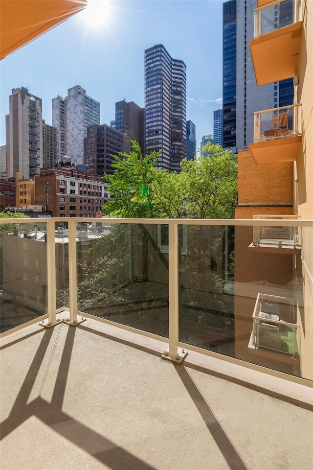 250 E 49th St Unit 5F, New York Manhattan, NY 10017 - balcony featuring a view of skyline