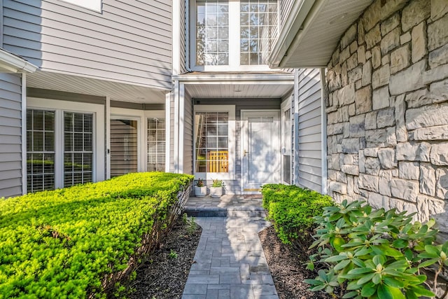19 Hampshire Ct, Holbrook, NY 11741 - view of exterior entry with stone siding