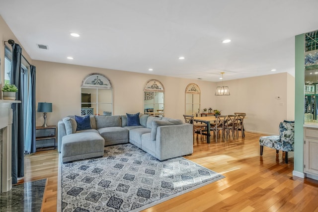 19 Hampshire Ct, Holbrook, NY 11741 - living area featuring light wood-type flooring and recessed lighting