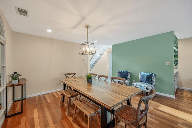19 Hampshire Ct, Holbrook, NY 11741 - dining area with stairs, light wood-style flooring, baseboards, and recessed lighting