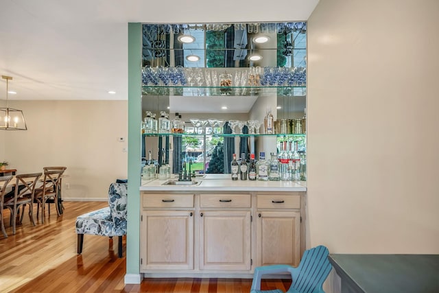 19 Hampshire Ct, Holbrook, NY 11741 - indoor wet bar with light wood-style flooring