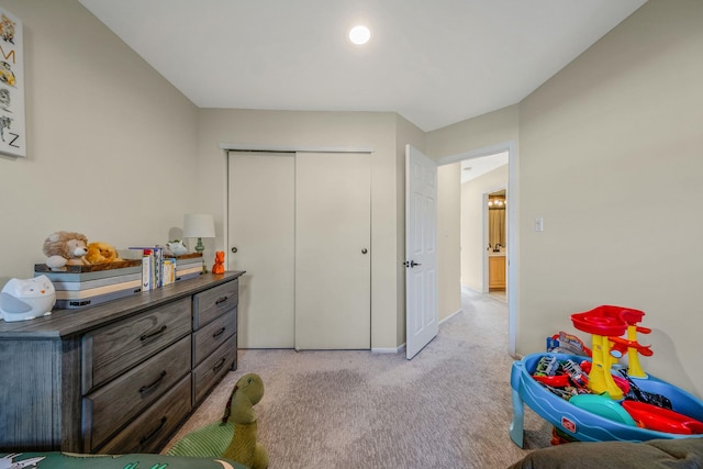 19 Hampshire Ct, Holbrook, NY 11741 - bedroom with light colored carpet, a closet, and baseboards