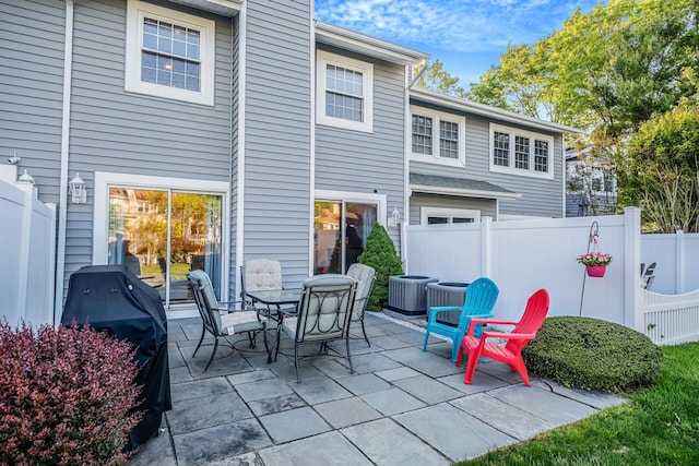 19 Hampshire Ct, Holbrook, NY 11741 - view of patio featuring central air condition unit and grilling area