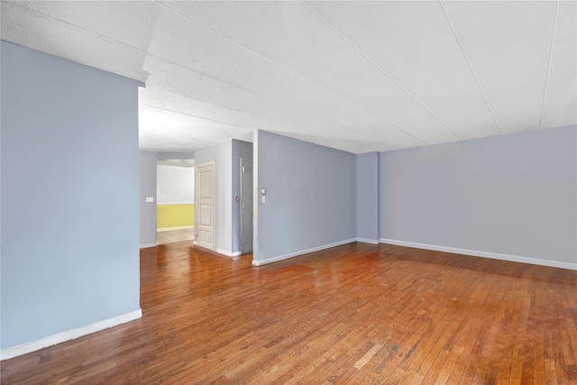 301 W 137th St Unit 301B, New York Manhattan, NY 10030 - unfurnished room with hardwood / wood-style flooring and baseboards
