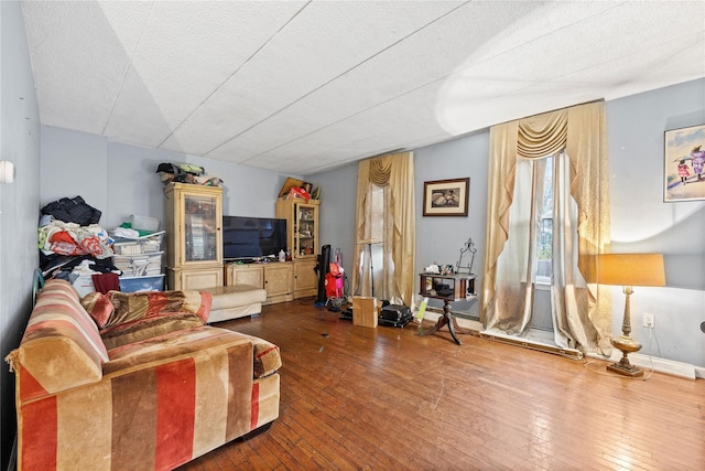 301 W 137th St Unit 301B, New York Manhattan, NY 10030 - living room featuring wood-type flooring and a textured ceiling