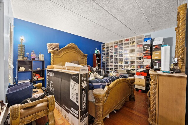 301 W 137th St Unit 301B, New York Manhattan, NY 10030 - bedroom with a textured ceiling and wood finished floors