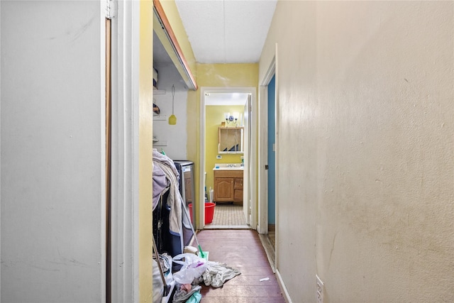 301 W 137th St Unit 301B, New York Manhattan, NY 10030 - laundry area featuring baseboards