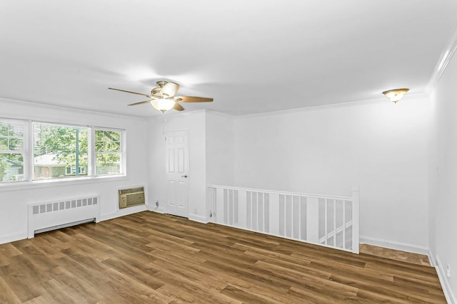 78-07 Springfield Blvd Unit B, Bayside, NY 11364 - unfurnished room featuring radiator heating unit, wood finished floors, ceiling fan, crown molding, and an AC wall unit