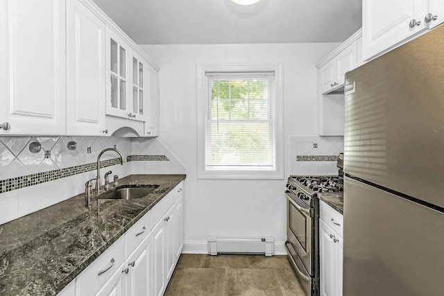 78-07 Springfield Blvd Unit B, Bayside, NY 11364 - kitchen with stainless steel appliances, a baseboard heating unit, white cabinetry, and backsplash