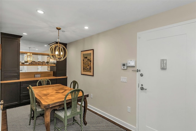 433 Main St Unit 203, Port Washington, NY 11050 - dining room featuring a chandelier, baseboards, and recessed lighting