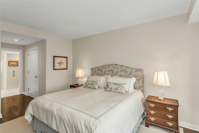433 Main St Unit 203, Port Washington, NY 11050 - bedroom featuring wood finished floors, baseboards, and recessed lighting