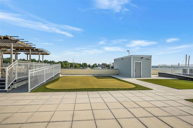 433 Main St Unit 203, Port Washington, NY 11050 - view of patio with a putting area and a pergola