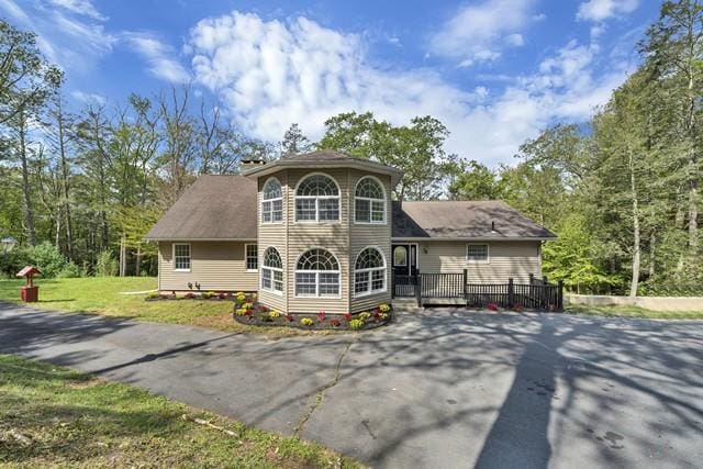 65 Old Cahoonzie Rd, Sparrowbush, NY 12780 - back of property featuring driveway and a lawn