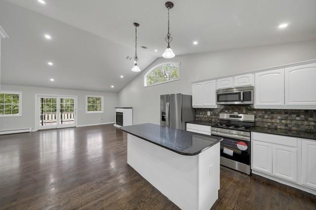 65 Old Cahoonzie Rd, Sparrowbush, NY 12780 - kitchen featuring stainless steel appliances, dark countertops, lofted ceiling, plenty of natural light, and recessed lighting