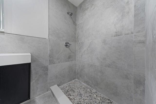 65 Old Cahoonzie Rd, Sparrowbush, NY 12780 - full bathroom with a tile shower and vanity