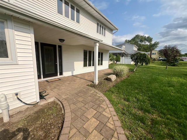 35 Thomas St, Coram, NY 11727 - view of green lawn with a patio