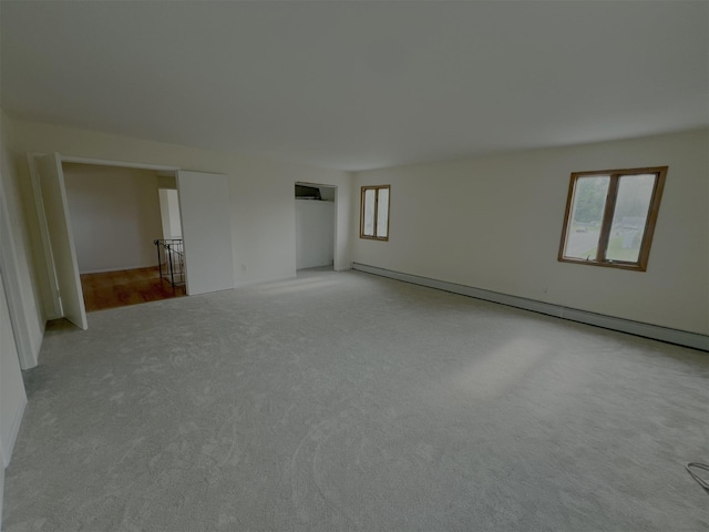 35 Thomas St, Coram, NY 11727 - unfurnished room featuring light carpet