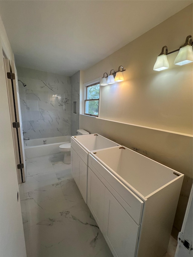 35 Thomas St, Coram, NY 11727 - bathroom with toilet, shower / bathtub combination, marble look tiles, and vanity