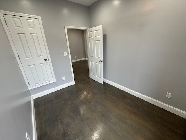 579 Van Siclen Ave, Brooklyn, NY 11207 - empty room featuring dark wood-style flooring and baseboards