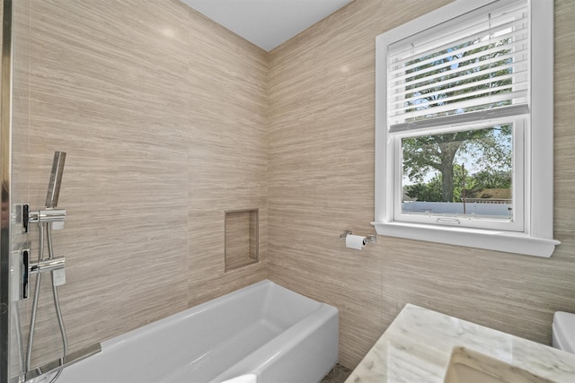 269 Hayward St, Yonkers, NY 10704 - full bathroom with a shower, a bath, and tile walls