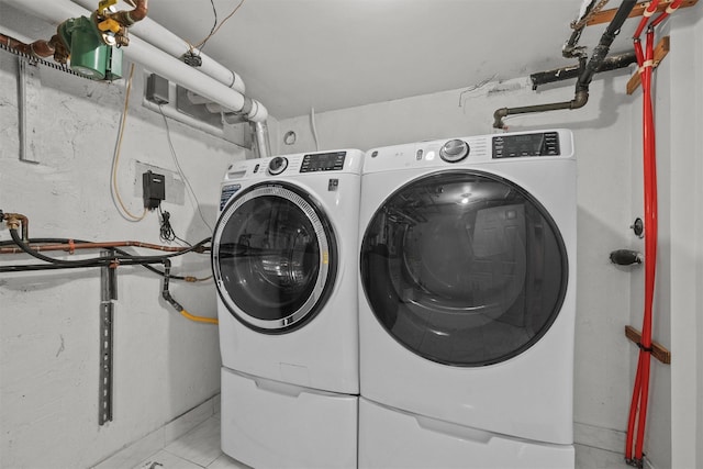 269 Hayward St, Yonkers, NY 10704 - washroom with washing machine and clothes dryer