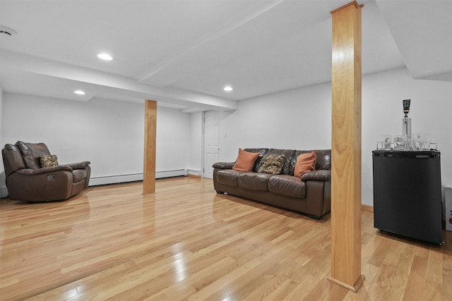 269 Hayward St, Yonkers, NY 10704 - living area featuring light wood-style floors, recessed lighting, and a baseboard heating unit