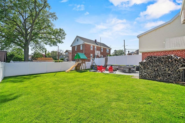 269 Hayward St, Yonkers, NY 10704 - view of yard with a playground and a patio