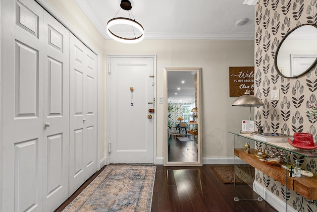 67-66 108th St Unit A32, Forest Hills, NY 11375 - entrance foyer with crown molding, wood finished floors, and baseboards