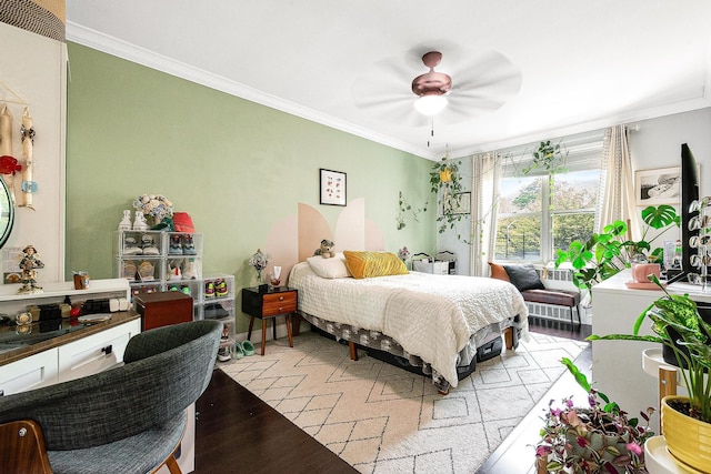 67-66 108th St Unit A32, Forest Hills, NY 11375 - bedroom with ornamental molding and ceiling fan