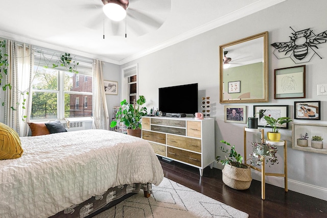 67-66 108th St Unit A32, Forest Hills, NY 11375 - bedroom featuring ornamental molding, dark wood-type flooring, baseboards, and ceiling fan