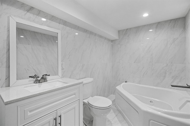32 Wilder Rd, Monsey, NY 10952 - bathroom with a jetted tub, tile walls, marble look tiles, toilet, and vanity
