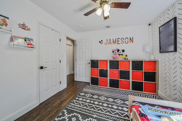bedroom with wood finished floors and ceiling fan