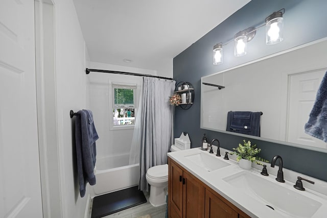 full bath with toilet, double vanity, shower / bath combination with curtain, and wood finished floors