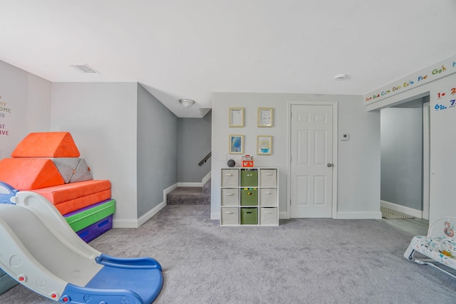 game room featuring carpet flooring and baseboards