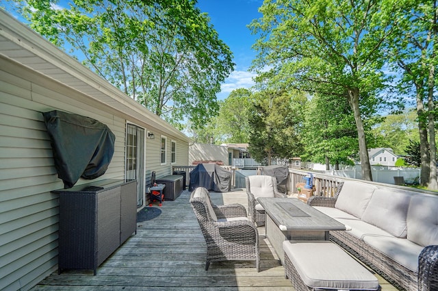 deck featuring an outdoor hangout area