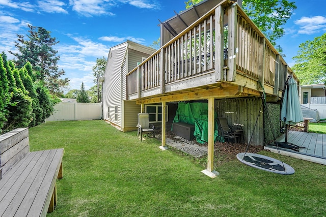 back of house featuring a wooden deck