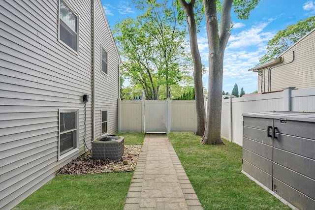 view of yard featuring central AC unit