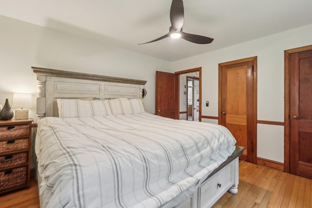 275 Otterkill Rd, Cornwall, NY 12553 - bedroom with light wood-style floors, ceiling fan, and baseboards